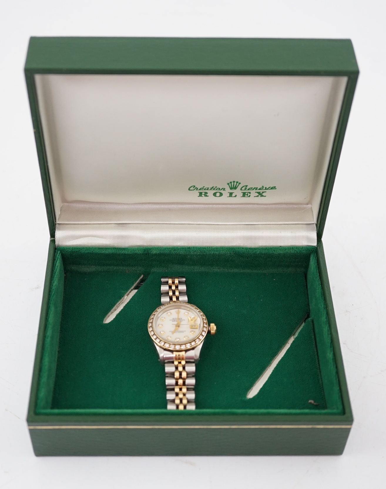 A lady's 1980's stainless steel and gold Rolex Oyster Perpetual Datejust wrist watch, with mother of pearl dial and diamond dot markers and bezel